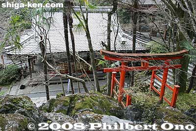 Go up the stone steps and pass by a Shinto shrine. 
Keywords: shiga otsu ishiyama-dera buddhist temple torii