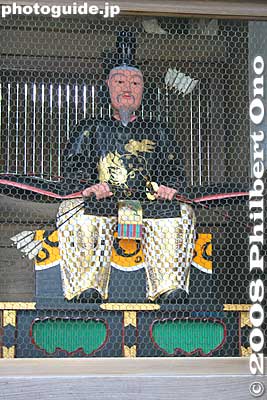 Figure in gate
Keywords: shiga yasu mikami jinja shinto shrine gate