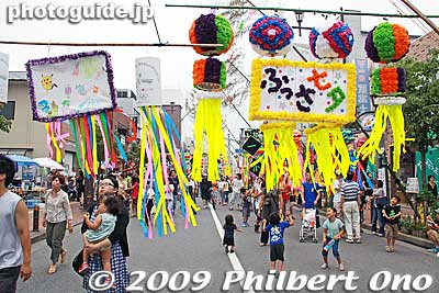 The festival is said to have originated from a Star Festival in China. According to Chinese legend, east of the Milky Way there was a Heavenly King whose daughter worked as a weaver. However, when she married a herdsman, she quit weaving.
Keywords: tokyo fussa tanabata matsuri festival star 