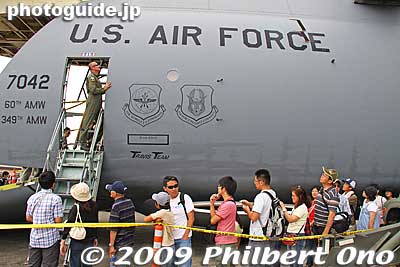 These people are lining up to see the C-5 Galaxy's cockpit on the upper deck.
Keywords: tokyo fussa yokota united states usa air base force military japanese-american japan america friendship festival airplanes jets aircraft 