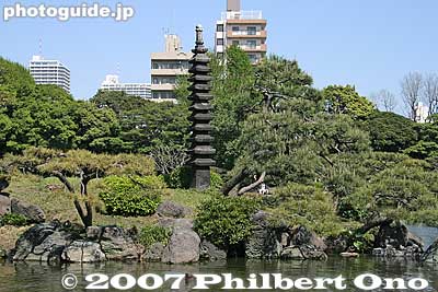 Stone pagoda on island named Matsushima
Keywords: tokyo koto-ku ward kiyosumi teien gardens pond pine tree matsu