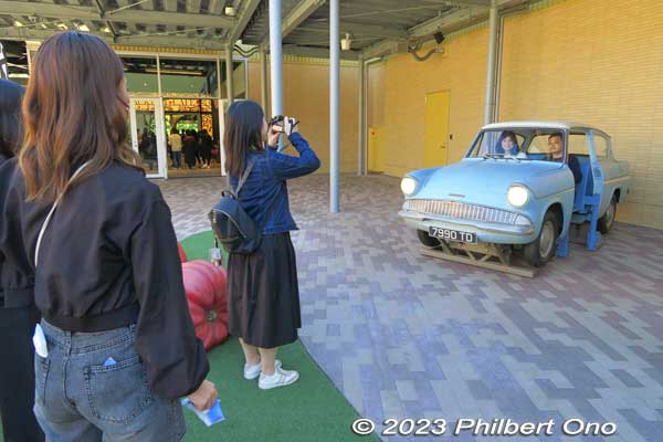 Photo op: In the Backlot, pose inside the Flying Car
