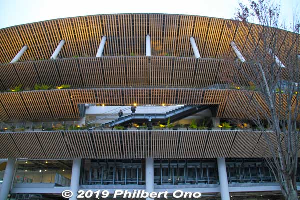 The stadium's design theme was "Forest Stadium." (杜のスタジアム). 
Lots of cedar lumber on the exterior. The wood came from all 47 prefectures and they point toward the place where they came from.
Keywords: tokyo shinjuku olympic national stadium
