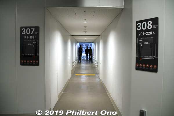 Narrow corridor to Blocks 307 and 308 on tier 3. No wheelchair seating here. 
Keywords: tokyo shinjuku olympic national stadium