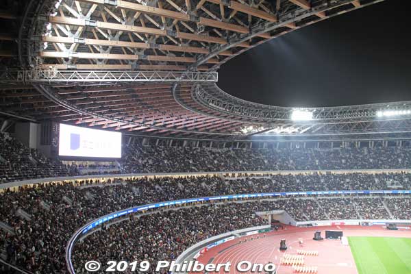 Spectator seating is pretty much covered by the roof, but windy rain can still reach people. The stadium was looking quite full.
Keywords: tokyo shinjuku olympic national stadium