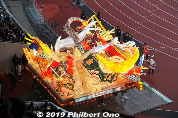 Nebuta floats are large wire-frame, paper lanterns shaped in various legendary and macho characters such as samurai warriors, demons, and gods. 
They are dramatically illuminated from the inside and paraded on the streets of Aomori city at night. They did not parade this big float on the track since it might damage the track. ねぶた祭
