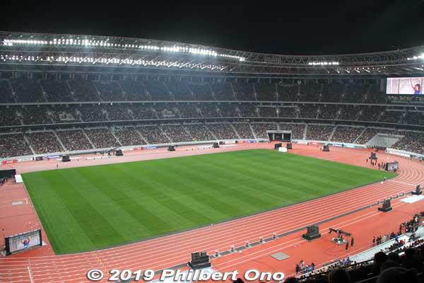 The opening event's sports highlight was the "One Race" featuring Olympians and Paralympians, both male and female. It was a relay race of four teams with six runners each. 
Two teams (Red and Green) represented Japan. The other two teams (Orange and Blue) represented the world. The world teams had only two runners each in the stadium. The remaining four runners would run in Los Angeles or Paris in real time. Each runner was to run 200 meters. https://ourstadium.jpnsport.go.jp/onerace/

