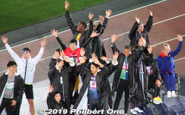 The runners celebrate on the podium.
Keywords: tokyo shinjuku olympic national stadium