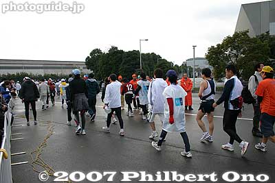 Runners after crossing the finish line.
Keywords: tokyo marathon race runners big sight koto-ku