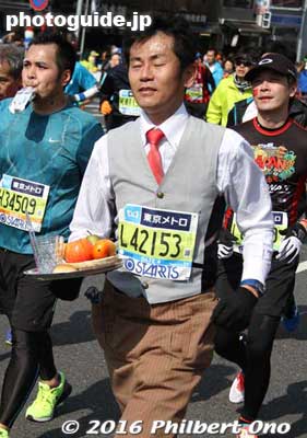 Waiter with fruits and water.
Keywords: tokyo marathon 2016 cosplayer runners costumes