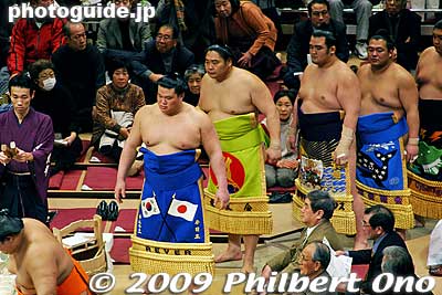 The colorful kesho mawashi are expensive to make, and each wrestler has a sponsor who donates an apron. The sponsor's name is usually on the bottom.
Keywords: tokyo sumida-ku ward ryogoku kokugikan sumo tournament ozumo rikishi wrestlers japankokugikan