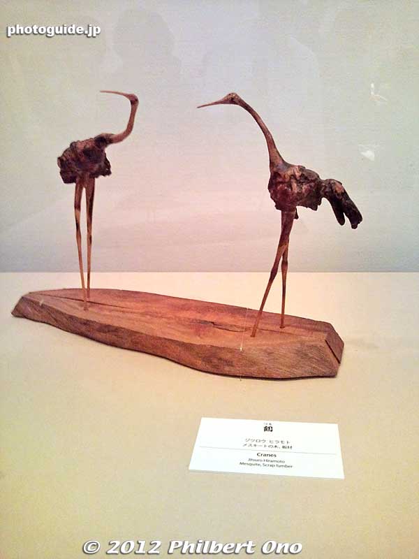 Pair of cranes made of scrap wood. There were other wooden sculptures of a lion, cow, snake, and boar, all from scrap wood.
Keywords: tokyo taito keno university art museum japanese american gaman
