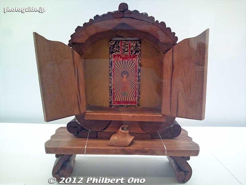 Buddhist altar made with scrap materials. The top roof was made of tree bark. 
Keywords: tokyo taito keno university art museum japanese american gaman