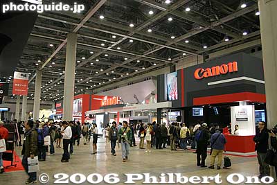 Canon booth
The Canon booth was very comprehensive and complete. They had a booth or counter for every imaging-related product, from movie cameras to D-SLRs to poster-size printers. They had everything. Of course the new EOS 30D was the main attraction as well as the 5D. Compared to the 20D, the 30D has a larger LCD monitor, a higher maximum burst during continuous shooting, and spot metering. The 8 megapixels and sensor size are the same. Canon says that this is the optimum pixel count for the supporting technologies in the camera. And that the image quality does not depend solely on the megapixel count.
Keywords: tokyo camera show big sight odaiba
