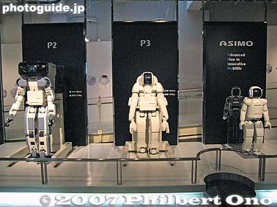 Three robots (including ASIMO) show how Honda improved its humanoid robot. From left to right, the robot got more compact.
Keywords: tokyo robotics show fair trade humanoid robots