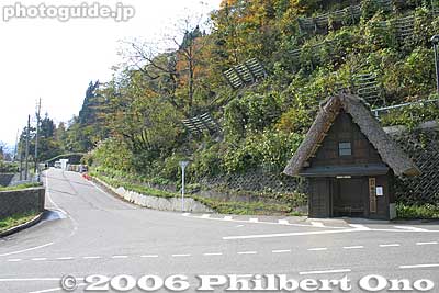 Entry road to Ainokura village. Bus stop shelter on right.
Keywords: toyama nanto ainokura gassho-zukuri thatched roof house minka